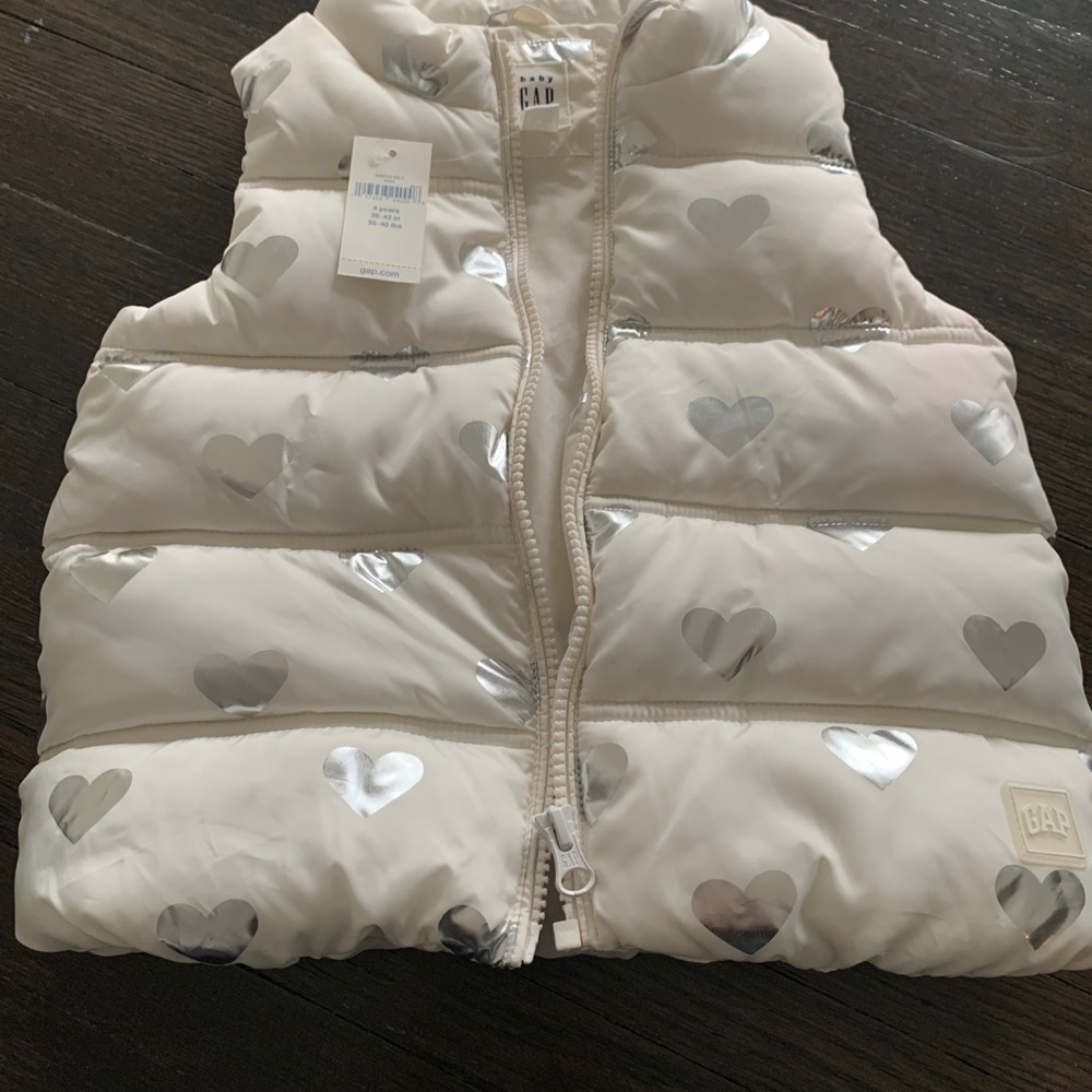 White and silver puffy vest with hearts